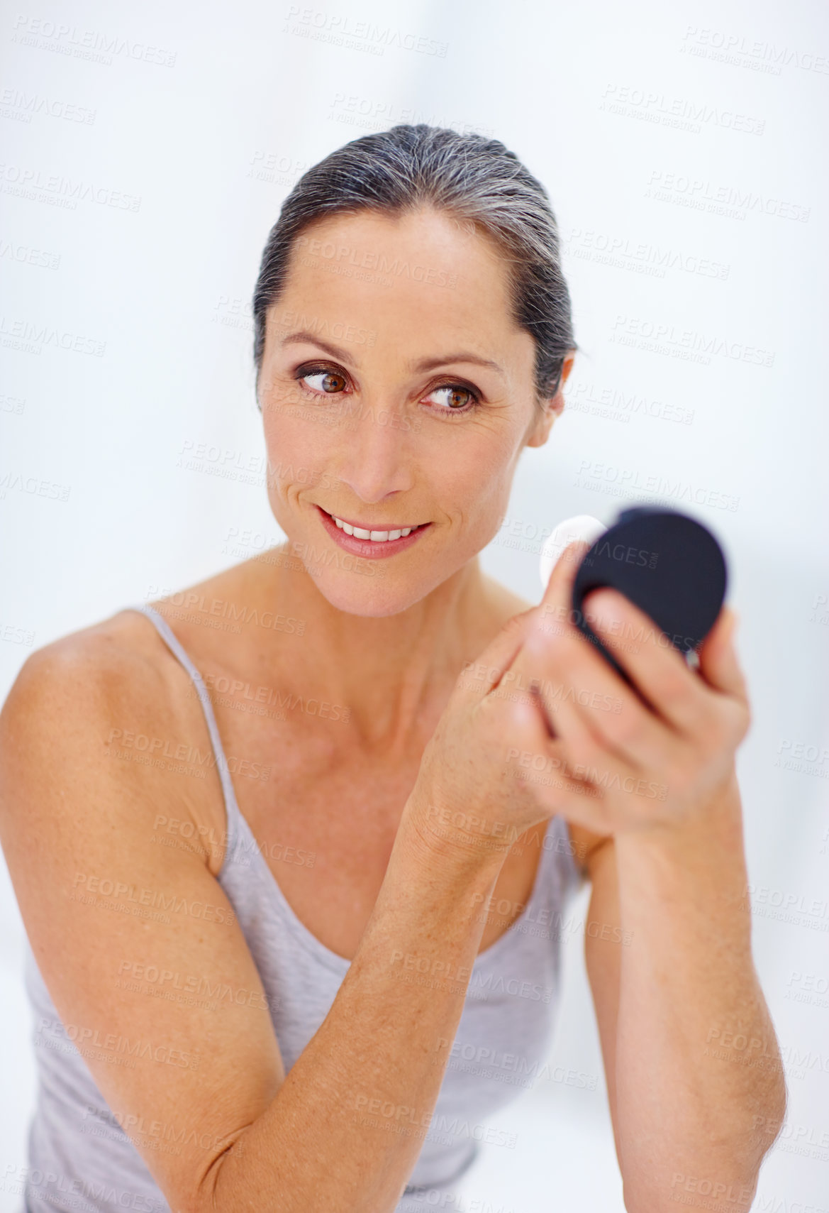 Buy stock photo Mature woman, happy and cotton pad as makeup removal for skincare and beauty routine. Female person, mirror and satisfied or smile with clear skin, glow and cleanser for self care and grooming
