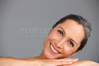 Buy stock photo Mature woman, skincare and studio portrait for cosmetics, confident collagen and gray background. Female person, hygiene and results of antiaging treatment, mockup space and smooth for dermatology