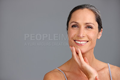 Buy stock photo Mature woman, beauty and studio portrait for cosmetics, confident collagen and gray background. Female person, hygiene and results of antiaging treatment, mockup space and smooth for dermatology