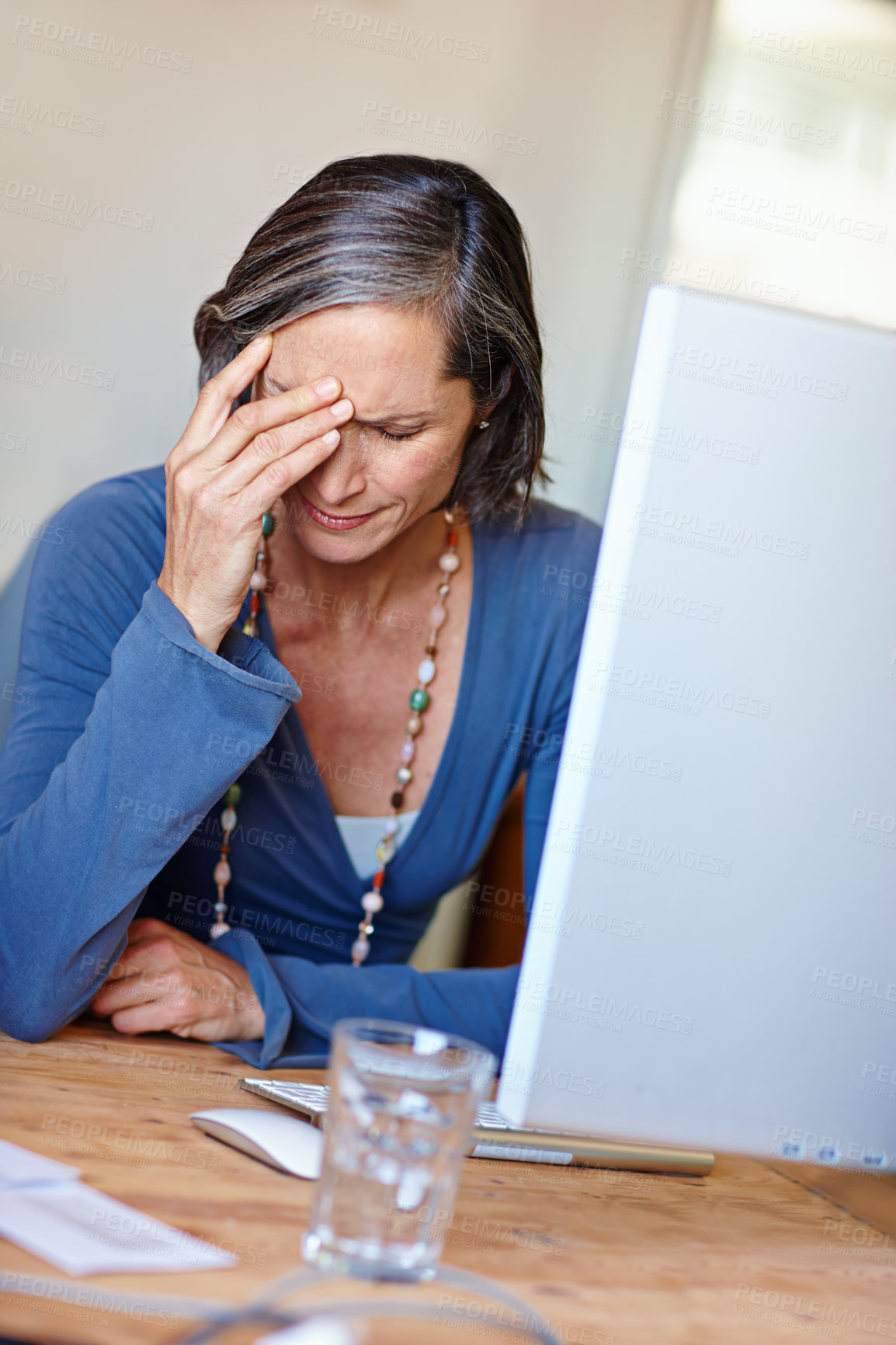 Buy stock photo Headache, computer and business woman in office, exhausted with 404 error, pain or web issue. Frustrated, fatigue and tired mature lady with stress, anxiety and burnout for management crisis at desk