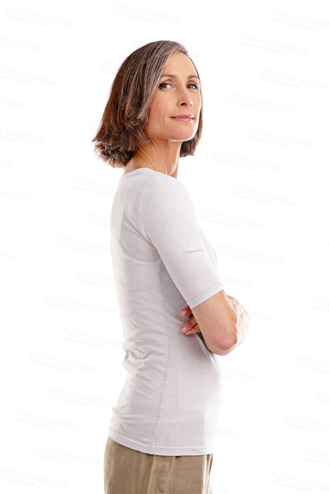 Buy stock photo Confident older woman with arms crossed on a white background. Side portrait of a casually dressed sassy female with attitude in studio. Smug looking grey haired woman. Assertive smiling mature lady