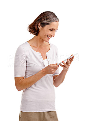 Buy stock photo Mature woman, studio and tablet with happiness for social media post and videos on white background. Female person, smile and satisfied on internet for communication, connection and networking