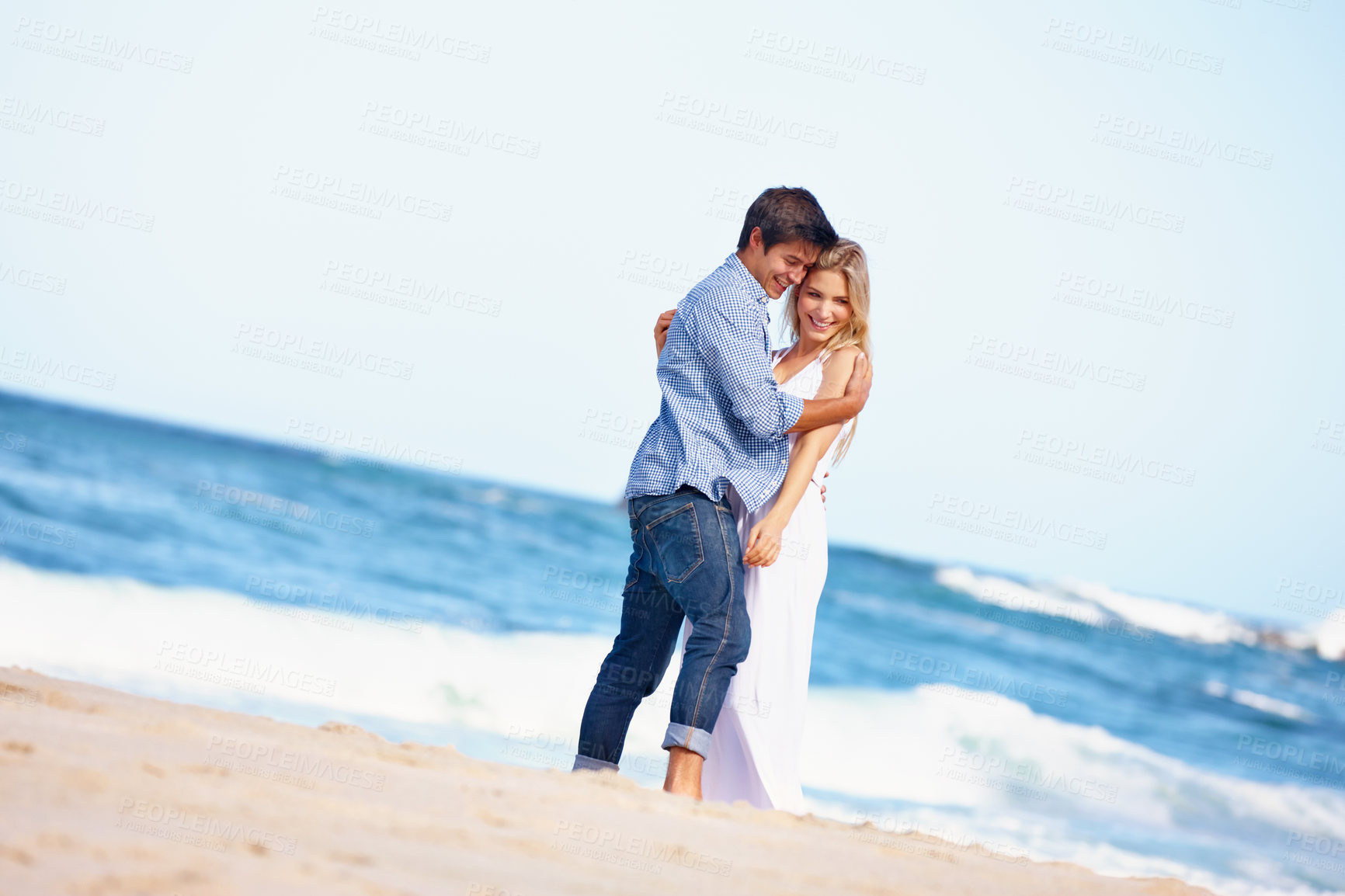 Buy stock photo Beach, hug and couple with love, waves and romance with vacation, honeymoon and bonding together. Travelling, seaside and man with woman, embrace and adventure with journey, relationship and marriage