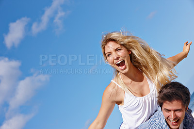 Buy stock photo Couple, piggyback and excited in nature for travel, love or summer vacation. Happy man, woman and airplane at beach for freedom, support or commitment in healthy relationship with sky space in Bali