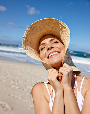 Buy stock photo Woman, hat and travel to beach on vacation, sun protection and ocean for water adventure. Female person, outdoor and playful girl on shore of tropical island, tourist and holiday trip to Mauritius