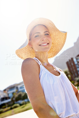 Buy stock photo Woman, portrait and hat with smile at beach for vacation, holiday or tourist adventure in Miami. Girl, coast and happy with summer break, travel and relax in nature for fresh air with seaside peace