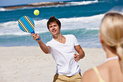 Buy stock photo Man, tennis and beach play by waves together for fun, holiday or bonding with sports and exercise in nature. Happy friends, game and Miami ocean with vacation, adventure and travel with trip