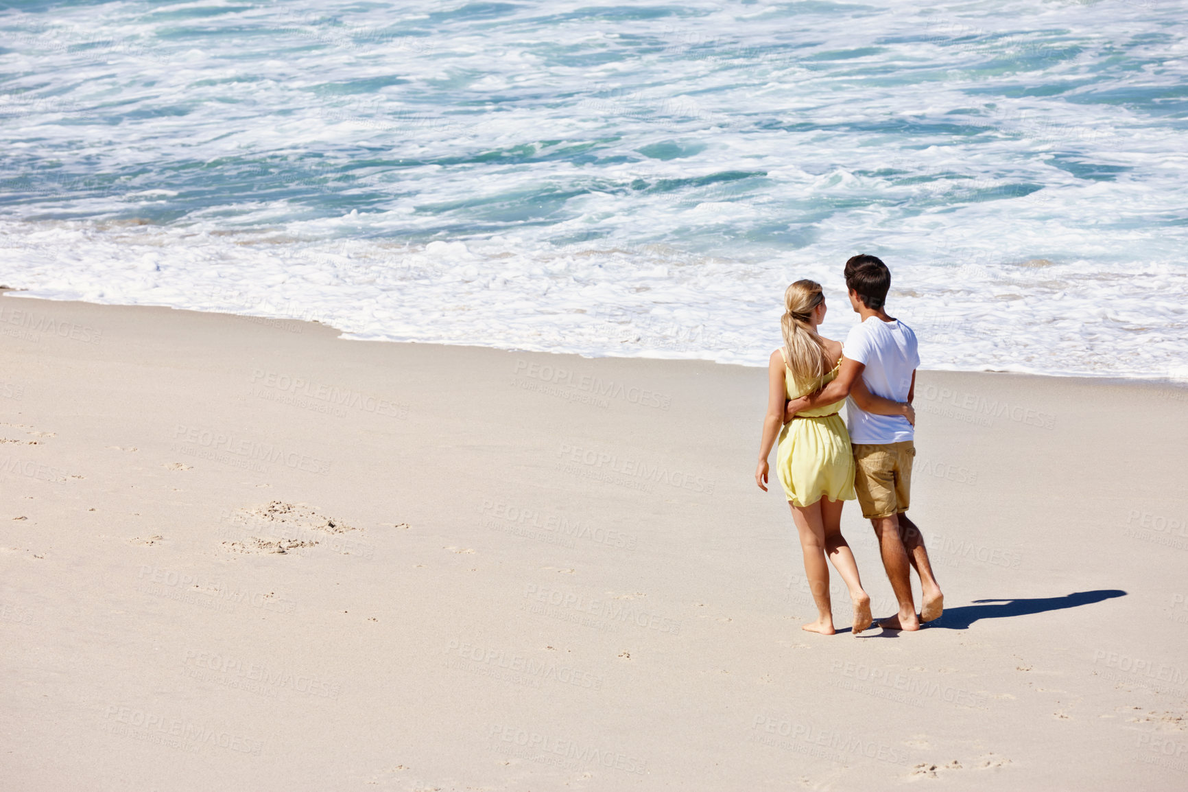 Buy stock photo Couple, romance and walking on beach for travel, bonding and tropical holiday with water and sand. Man, woman and care outdoor for fun trip, love and vacation with sunshine, relax and date on weekend