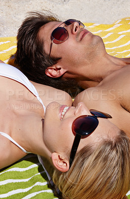 Buy stock photo Relax, tanning or couple at sea with towel or sunglasses on summer vacation, valentines day or holiday. Face, anniversary or people sunbathing at beach for bonding together on romantic trip in Greece