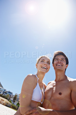 Buy stock photo Couple, happy and sunshine at beach for travel, bonding and tropical holiday with smile on sand. Man, woman and romance outdoor for trip, love and vacation with happiness, relax and date in Thailand