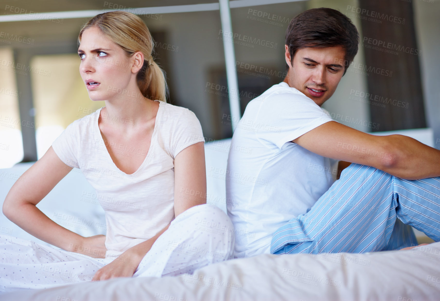 Buy stock photo Home, couple and ignore with anger for argument, disagreement and conflict for misunderstanding. House, man and sad woman with fight for affair, frustrated and thinking of divorce for sad marriage 