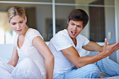 Buy stock photo Home, couple and communication with anger for fight, disagreement and conflict for misunderstanding. House, woman and frustrated man with shouting for affair, cheating partner and problem for divorce