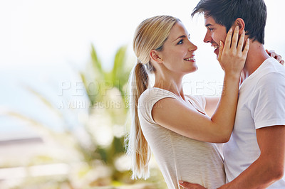 Buy stock photo Balcony, couple and happy with hug for bonding, connection or commitment with love in relationship. Outside, man and woman with smile for dating, support or admiration with trust on romantic vacation