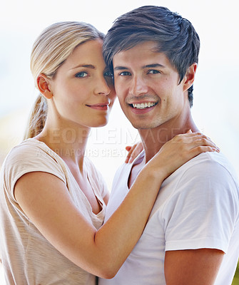 Buy stock photo Balcony, couple and portrait with hug for dating, bonding or commitment with trust in healthy relationship. Outside, man and woman with smile for love, support or romantic with connection on vacation