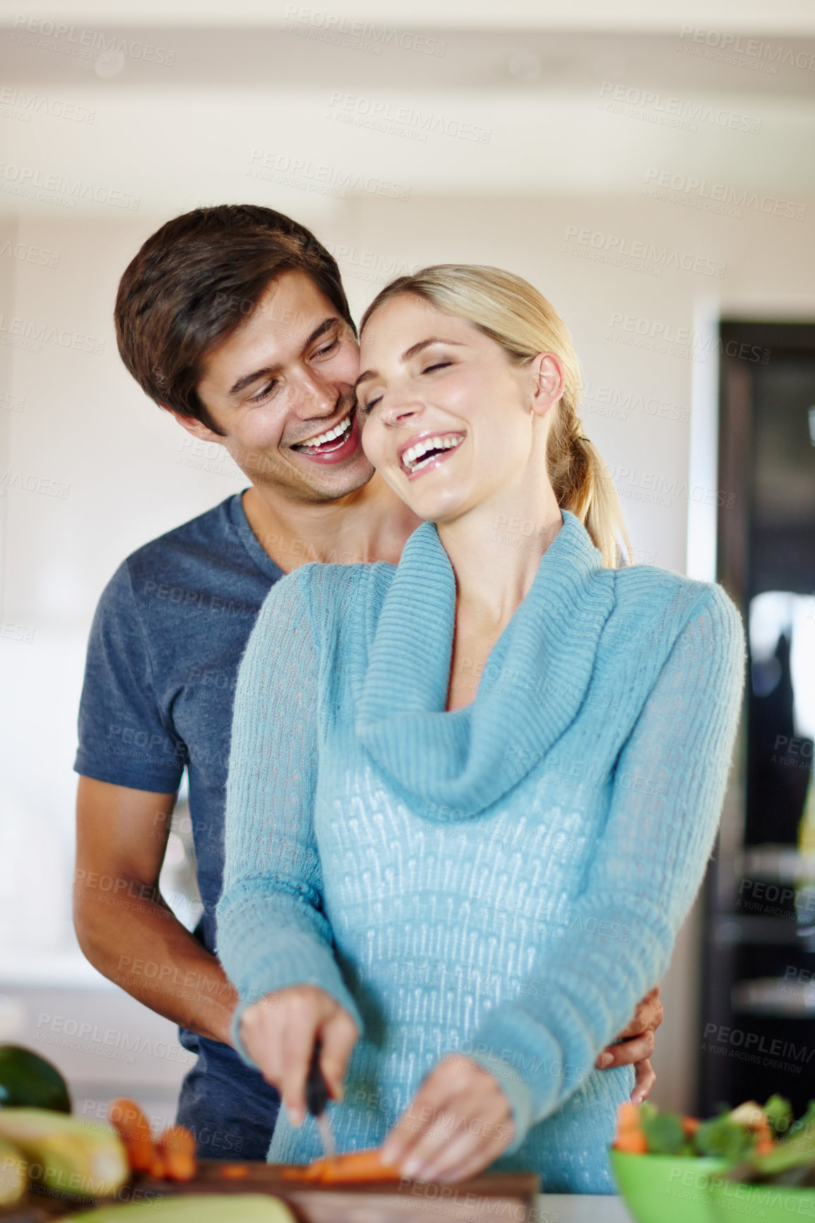 Buy stock photo Couple, kitchen counter and happy with vegetables for thanksgiving dinner or meal. People, relationship and smile or laughing at home with food preparation on bonding, support and trust for care