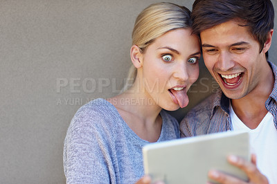 Buy stock photo Happy, selfie and couple with funny face on tablet for online chat, social media and bonding on weekend. Relax, dating and man and woman on digital tech for internet, website and picture in town