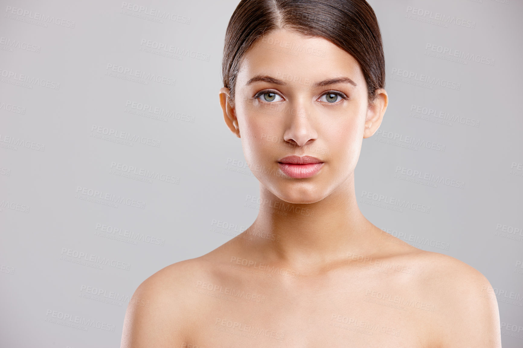 Buy stock photo Portrait, beauty and woman with cosmetics, skincare and dermatology on gray studio background. Face, person and model with grooming routine, treatment and shine with glow, healthy skin and wellness
