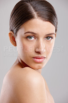 Buy stock photo Portrait, wellness and woman with cosmetics, skincare and dermatology on gray studio background. Face, person and model with grooming routine, treatment and shine with glow, healthy skin and beauty