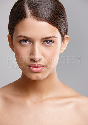 Buy stock photo Studio portrait of a beautiful young woman with flawless skin