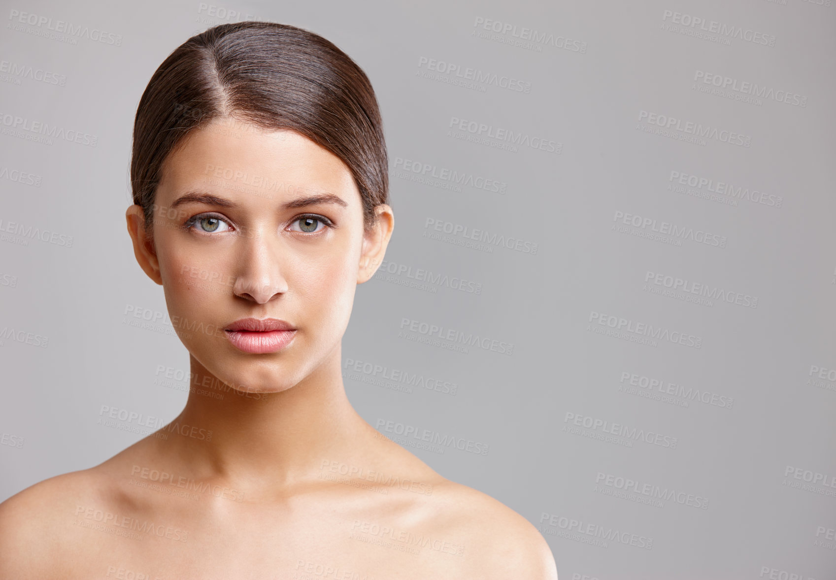 Buy stock photo Studio portrait of a beautiful young woman with flawless skin