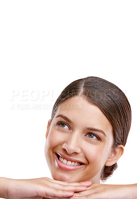 Buy stock photo Cropped studio shot of a beautiful young woman posing against a white background