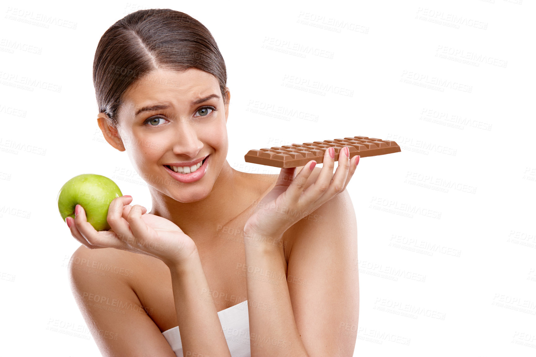 Buy stock photo Apple, chocolate and portrait of woman in studio isolated on white background for choice or decision. Diet, health or nutrition and model choosing cheating or discipline for losing weight temptation