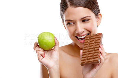 Buy stock photo Chocolate, fruit and smile of woman in studio isolated on white background for sugar craving. Aesthetic, beauty and mockup space with model biting slab for cheating, temptation or unhealthy snack