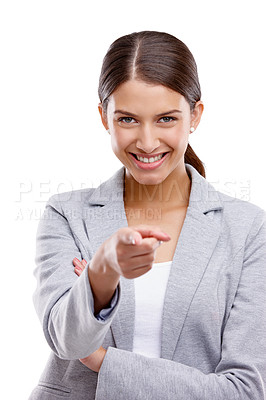 Buy stock photo Studio shot of a confident young woman pointing towards the camera against a white background