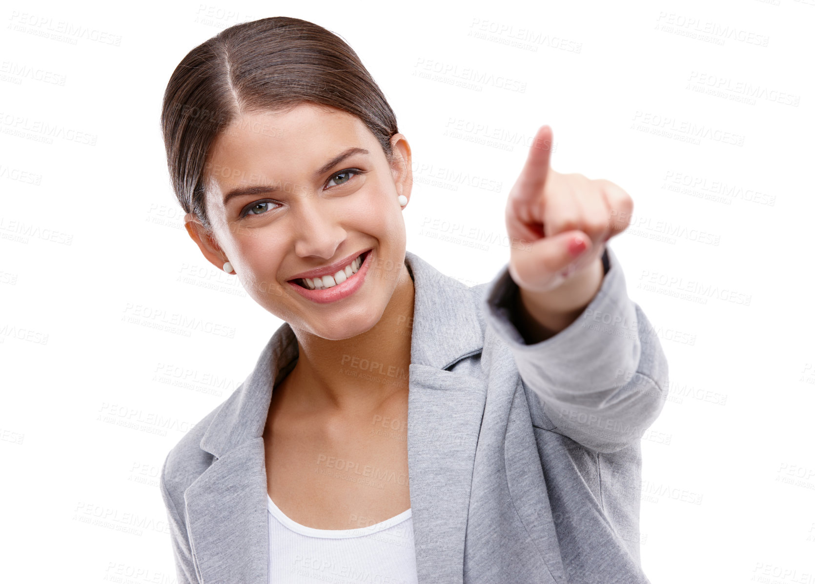 Buy stock photo Studio shot of a beautiful young woman pointing towards something against a white background
