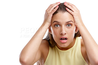 Buy stock photo Studio shot of a beautiful young woman covering her head in regret against a white background 
