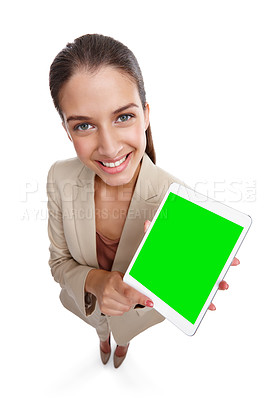 Buy stock photo High angle studio shot of a beautiful young businesswoman holding a digital tablet against a white background