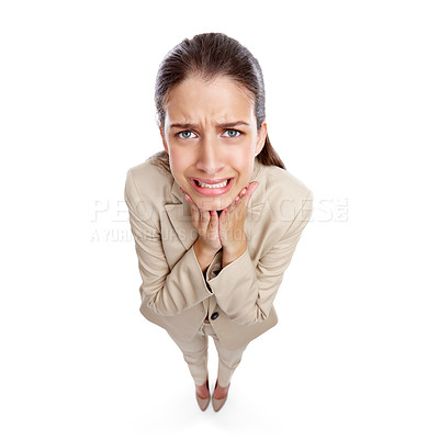 Buy stock photo High angle studio shot of a beautiful young businesswoman looking anxious against a white background