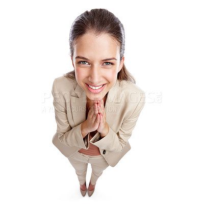 Buy stock photo High angle studio shot of a beautiful young businesswoman looking pleased against a white background