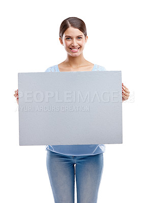 Buy stock photo Woman, happy portrait and blank board standing in white background for advertising, marketing and branding vision. Model, smile and holding empty poster, billboard or banner mockup isolated in studio
