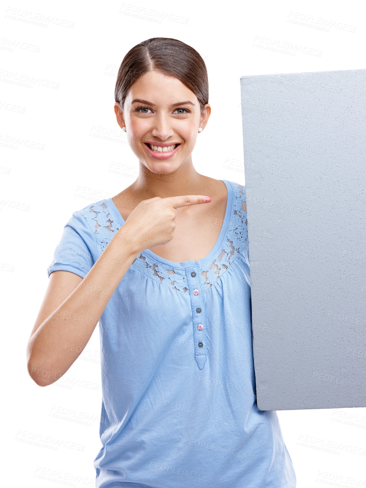 Buy stock photo Portrait, pointing and blank sign with a woman in studio isolated on a white background holding a poster for branding. Logo, marketing and brand with a female showing mockup space for advertising