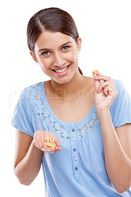 Buy stock photo Portrait, pills and medical with a model woman in studio isolated on a white background for vitamins or supplements. Medicine, health and tablet with a young female on blank space for medication