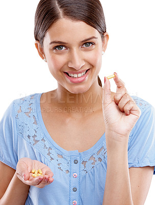 Buy stock photo Portrait, tabket and medicine with a model woman in studio isolated on a white background for vitamins or supplements. Medical, health and pills with a young female on blank space for medication
