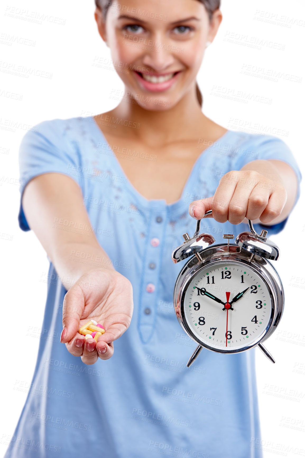 Buy stock photo Pills, clock and portrait of a woman in a studio waiting to take medicine, vitamins or supplements. Tablets, health and female model with alarm as a medication reminder isolated by white background.