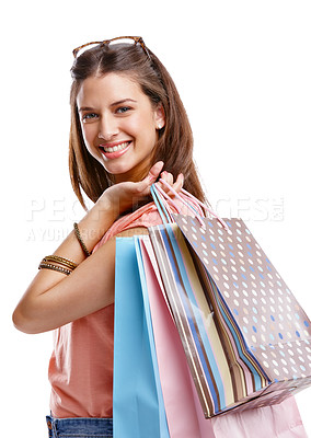 Buy stock photo Shopping, model and portrait of a young woman smile with retail bags, discount and shopping bags. Isolated, white background and customer happy about store sale, fashion choice and consumer buy