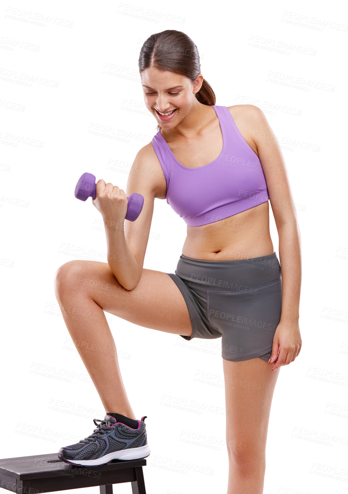 Buy stock photo Shot of a beautiful woman training with weights