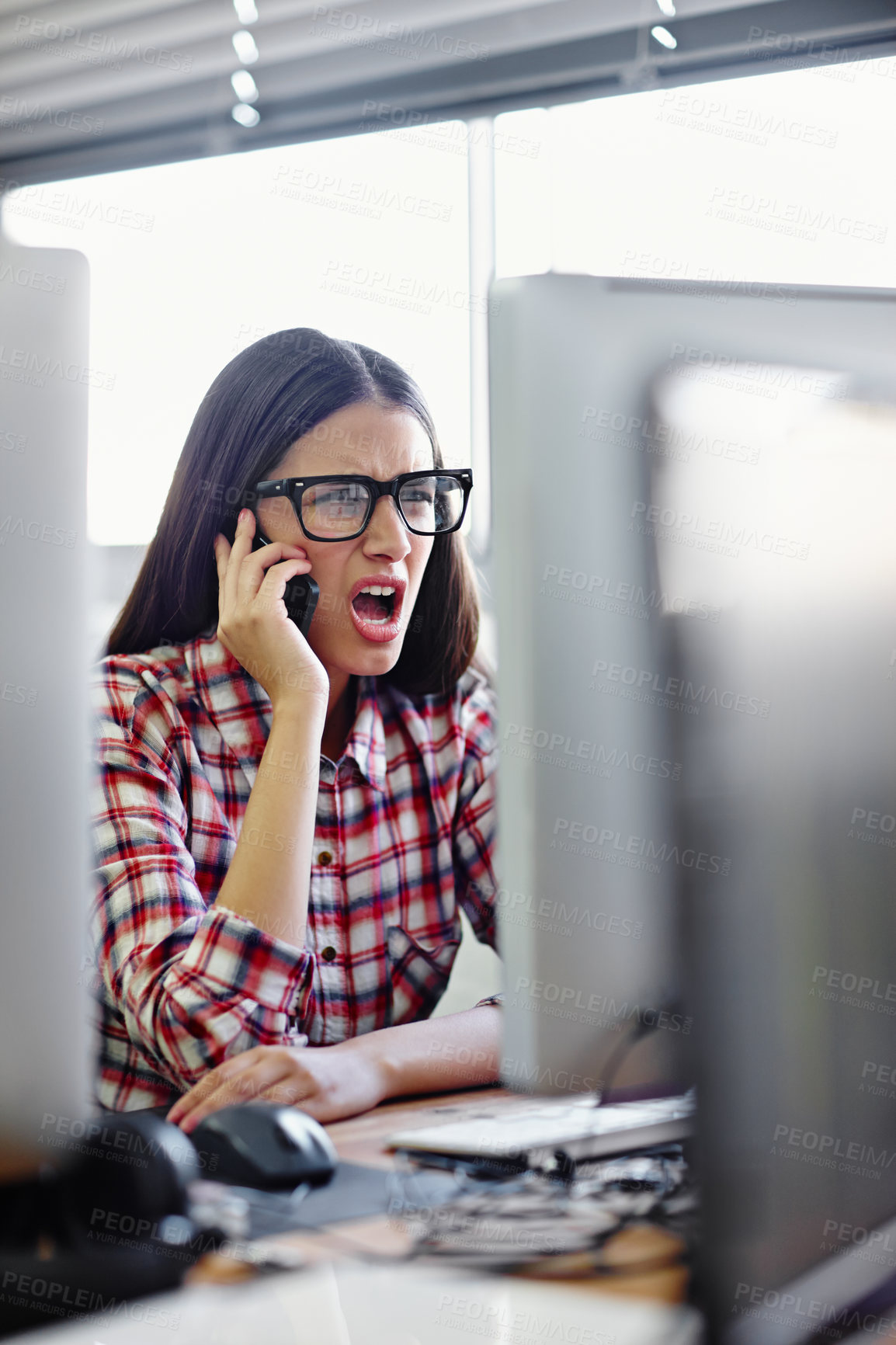 Buy stock photo Business woman, angry and phone call in office for feedback, communication and networking with glasses. Graphic designer, upset and computer with client review for website glitch, fail and frustrated