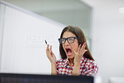 Buy stock photo Shot of a young designer shouting