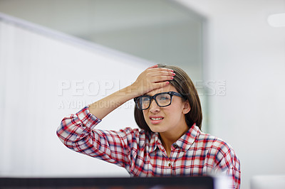 Buy stock photo A beautiful young designer looking confused