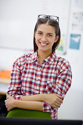 Buy stock photo Shot of a beautiful young woman in her office