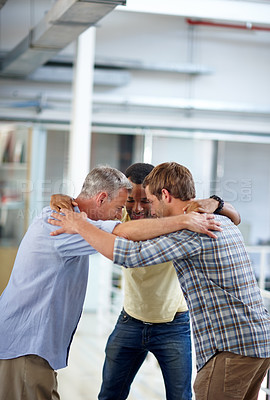 Buy stock photo Business, men and happy with hug in circle at office for team building, collaboration and support for project. People, employees and smile in startup company with synergy or huddle for coworking