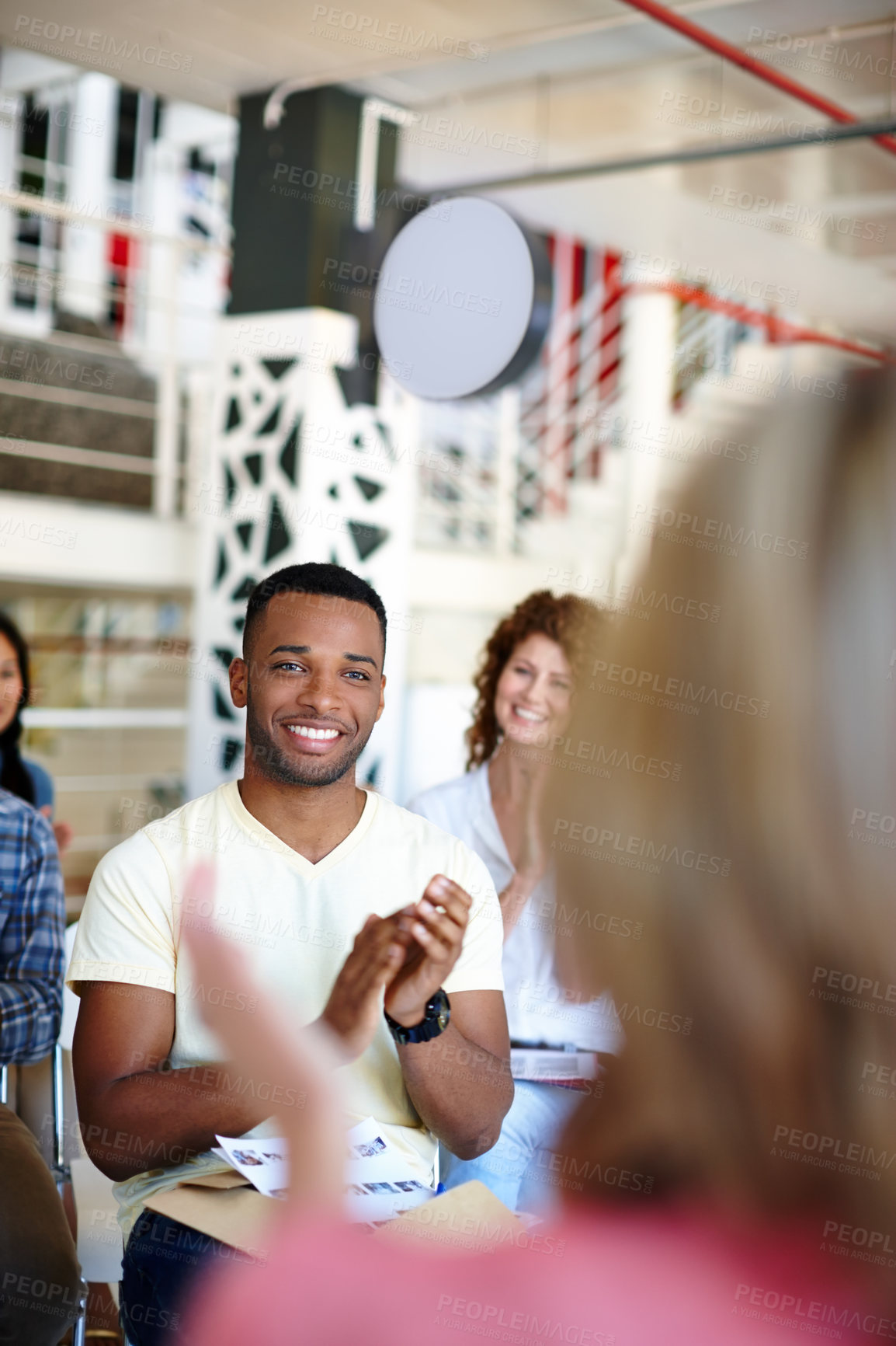 Buy stock photo Shot of coworkers applauding a presentation in a casual office environment