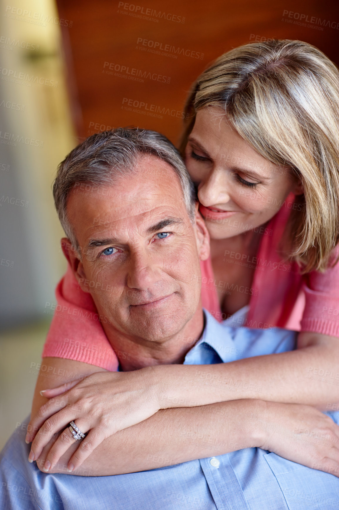 Buy stock photo Home, mature couple and portrait with hug for connection, admiration and bonding in healthy marriage. House, man and woman with love embrace for affection, support and commitment in relationship