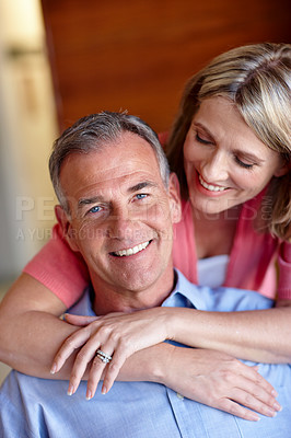 Buy stock photo Portrait of a husband and wife sharing an affectionate moment together at home