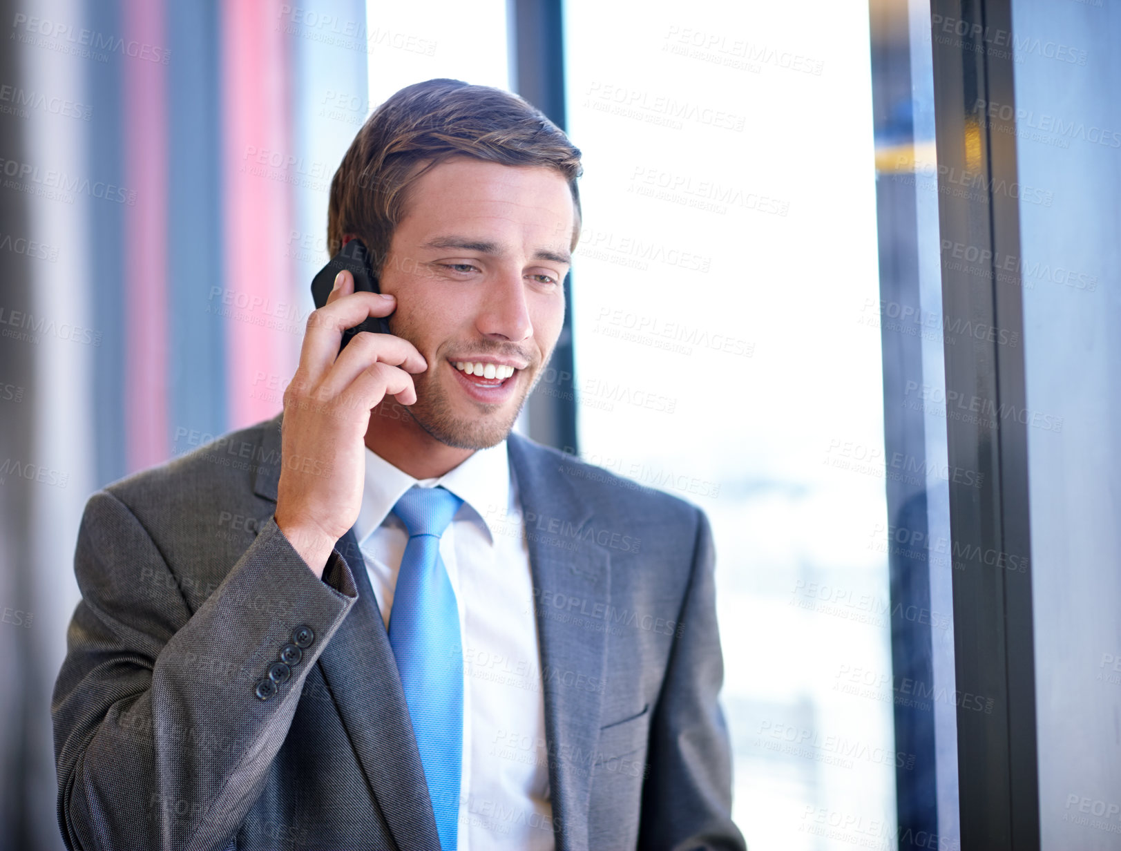 Buy stock photo Smile, business and man with phone call in office for communication, legal advice and finance feedback. Happy, male accountant, mobile and talking with networking, negotiation and project opportunity