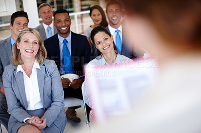 Buy stock photo Shot of a group of colleagues enjoying their office presentation